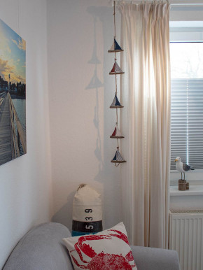 Girlande bunte Segelboote am Seil